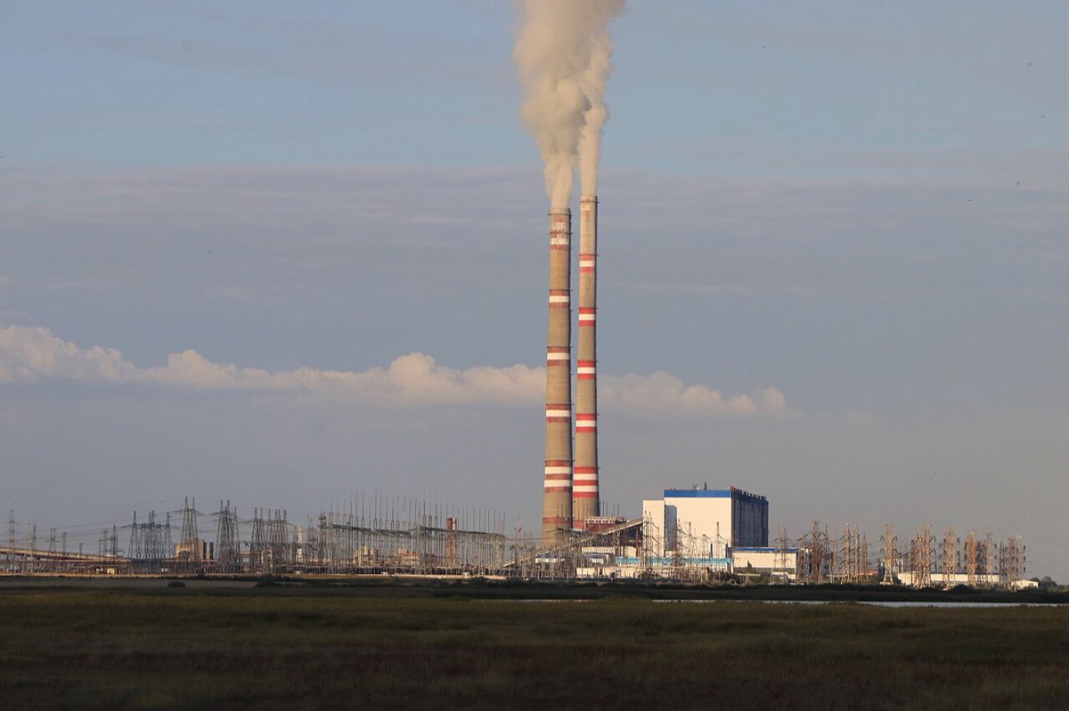 Twin chimneys of the GRES-1 coal power station on the steppe outside Ekibastuz.